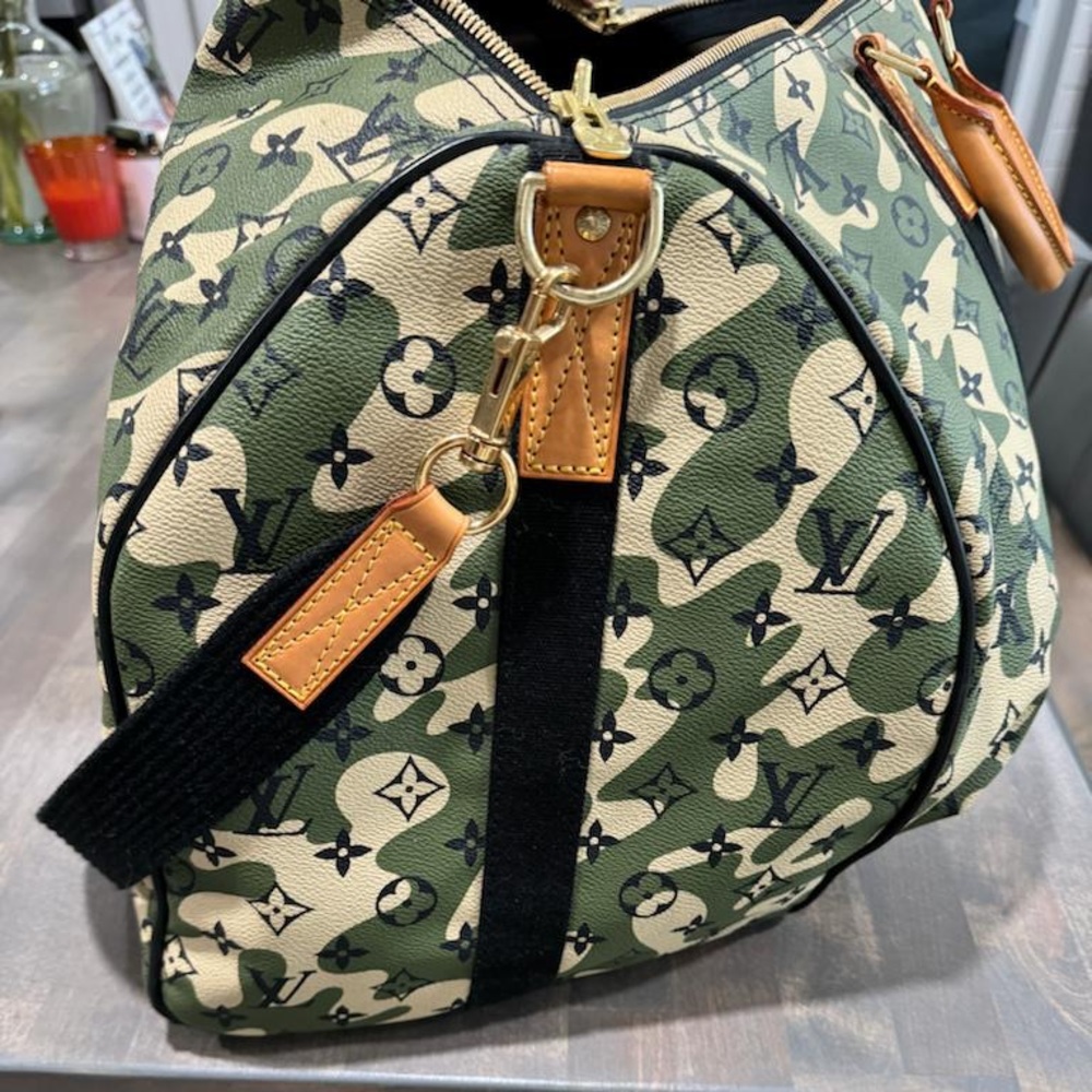 Limited edition Louis Vuitton
Monogram Camouflage 
Takashi Murakami
Used only 2x